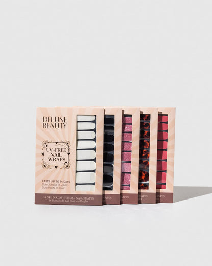 Blush (Non-UV Nail Wraps): row of Delune Beauty UV-free nail wrap packs standing upright